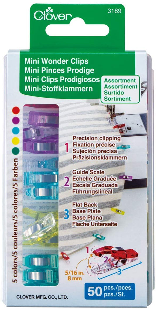 Packaging of Clover Mini Wonder Clips in assorted colors. The package contains 50 clips used for holding fabric pieces together in sewing and crafting projects.
Photo by Clover-USA.com [image_link]