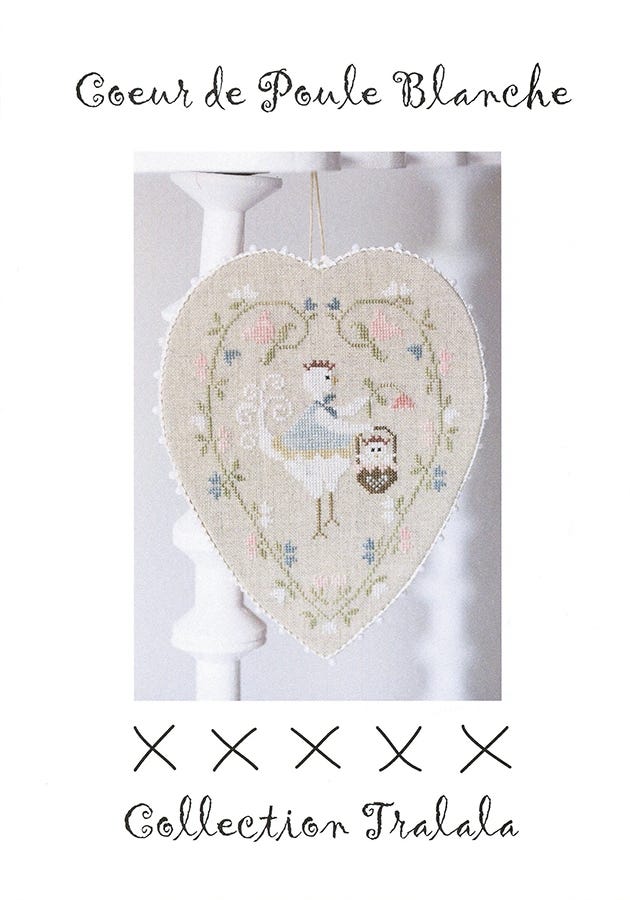 Cross stitch embroidery kit depicting a white hen heart pattern in a heart-shaped linen fabric, with color photos and stitch diagrams.
Photo by Tralala [image_link]