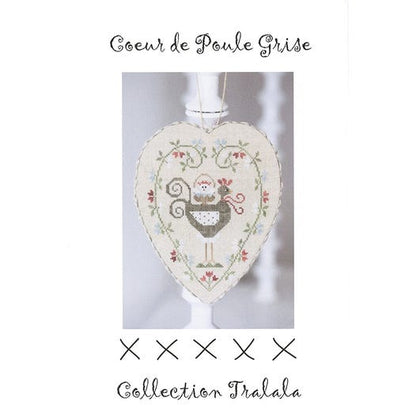 A cross stitch embroidery kit depicting a gray hen heart pattern, labeled in French, with the brand name 'Tralala' shown at the bottom.
Photo by Tralala [image_link]
