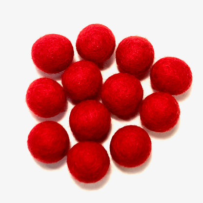 A cluster of ten small, bright red felt balls arranged on a plain white background.
[additional_image_link]