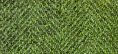 A close-up of a green herringbone woven wool with a soft, fuzzy surface.
Photo by Weeks Dye Works [additional_image_link]