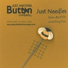 Packaging of a decorative counting pin with a bee design on a tapestry needle, branded by Just Another Button Company.
Photo by JustAnotherButtonCompany.com [additional_image_link]