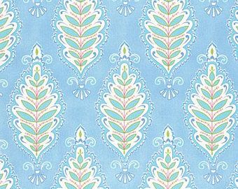 Light blue fabric or wallpaper pattern featuring repeating vertical botanical motifs in white, mint green, and soft pink.
[additional_image_link]