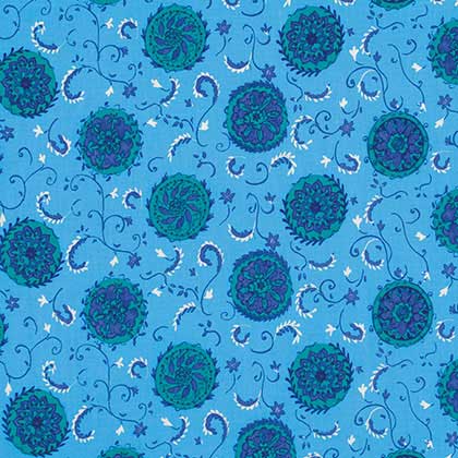 A repeating fabric pattern featuring teal and dark blue mandala-like floral motifs on a bright blue background, accented with small white stars and curved vine details.
[additional_image_link]