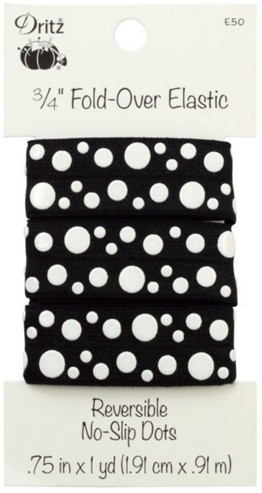 Dritz 3/4 inch fold-over elastic in a black and white reversible no-slip dots pattern, packaged on a white cardboard hanger.
Photo by Dritz [image_link]