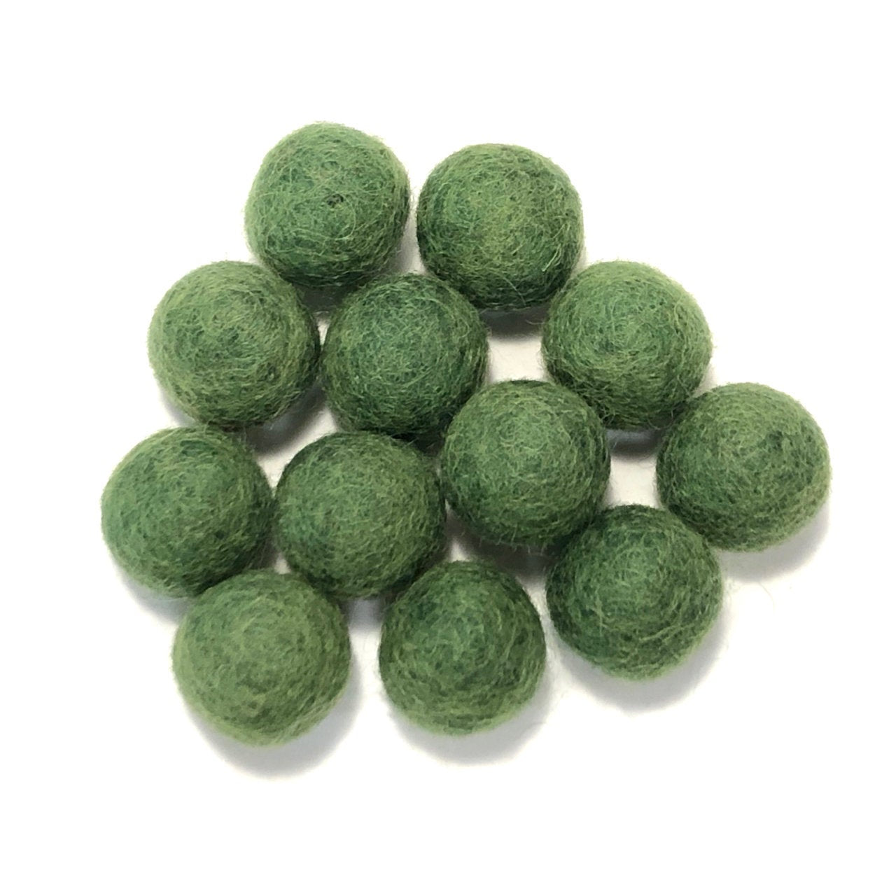 A group of ten green felt wool balls arranged in a cluster on a plain white background.
[additional_image_link]