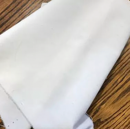 White velveteen fabric.
[additional_image_link]