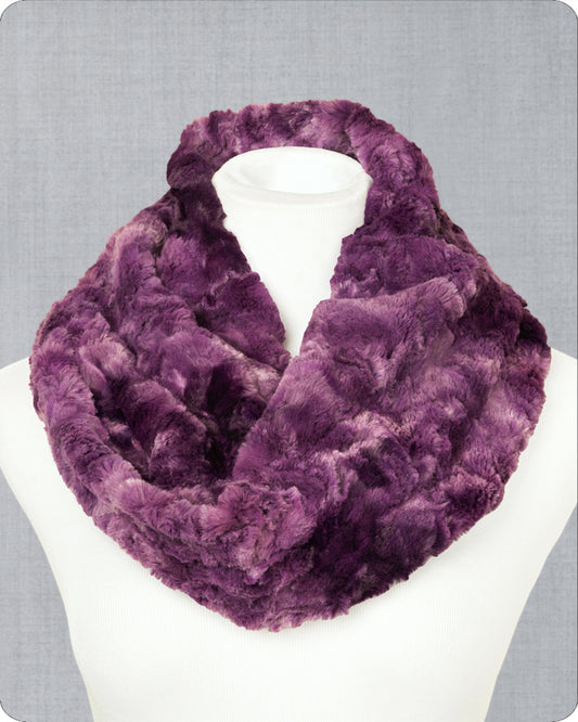 Purple fur infinity scarf on a mannequin against a gray background.
Photo by Shannon Fabrics [image_link]
