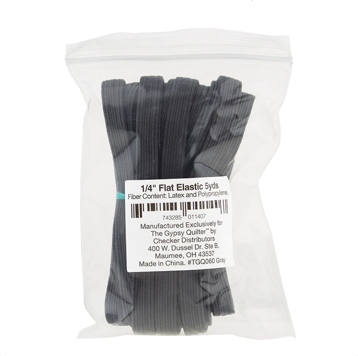 A pack of flat gray elastic bands, labeled as 1/4 inch elastic, 5 yards in length, made by Gypsy Quilter.