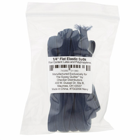 Packaged navy blue flat elastic bands, labeled as 1/4 inch elastic content per package.
Photo by The Gypsy Quilter [image_link]