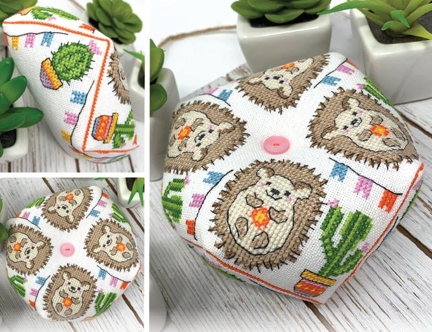 Hexagonal fabric dice with hedgehog and cactus patterns on a wooden surface.
Photo by Tiny Modernist [additional_image_link]