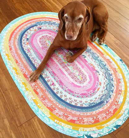 Multicolor jelly roll rug with a dog.
Photo by R.J .Designs [additional_image_link]