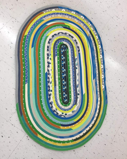 Multicolor jelly roll rug.
Photo by R.J .Designs [additional_image_link]