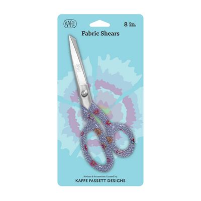 Kaffe Fassett 8 inch fabric shears with embellished handles, displayed on a card with floral design.
Photo by Kaffe Fassett [image_link]