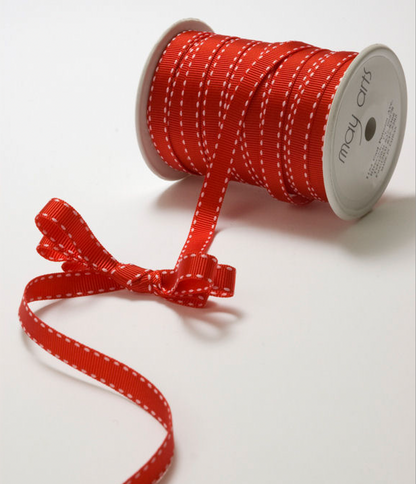 A spool of red grosgrain ribbon with white stitching, featuring a decorative bow with the ribbon trailing, on a white background. The spool has the brand name 'may arts' printed on it.
[additional_image_link]