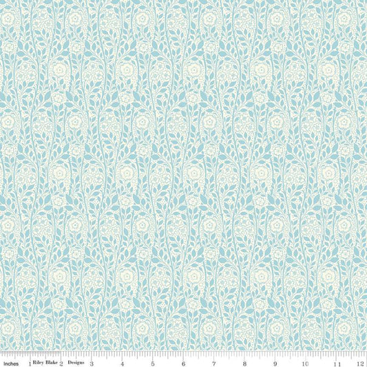 Yardage of Merton Rose B fabric from the Emporium Collection in Discovery Colorway by Liberty Fabrics for Riley Blake Designs, displaying a floral pattern on a blue background.
Photo by RileyBlakeDesigns.com [image_link]