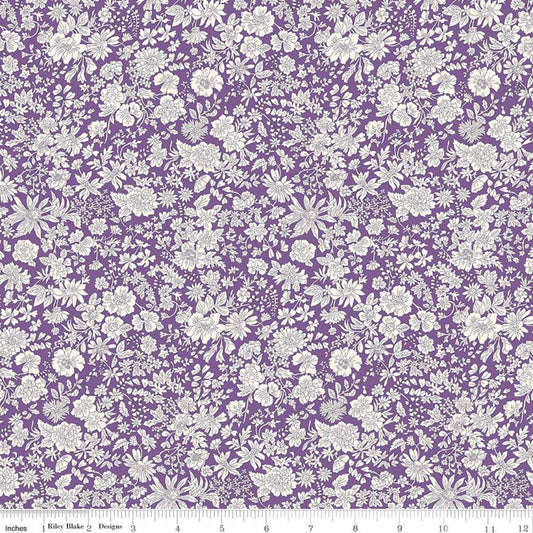 Purple and white floral fabric pattern with a ruler scale at the bottom showing measurements.
Photo by RileyBlakeDesigns.com [image_link]