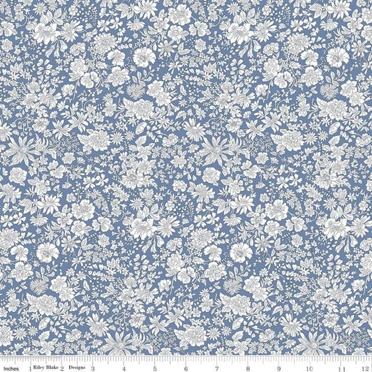 Yardage of Liberty Fabrics Emily Belle Evening Sky, featuring a blue floral pattern with small white flowers on a cotton fabric.
Photo by RileyBlakeDesigns.com [image_link]