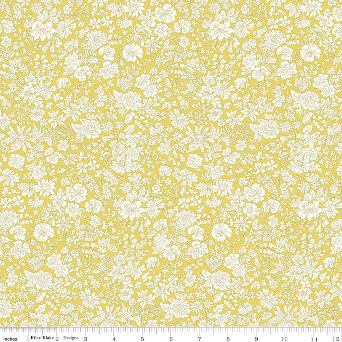 Yellow fabric with a dense white floral toile pattern, shown flat with a ruler along the bottom edge for scale.
Photo by RileyBlakeDesigns.com [image_link]