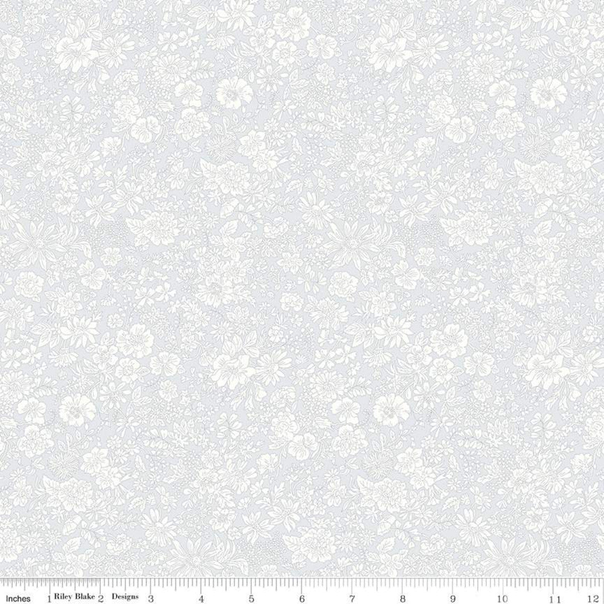 A fabric from the Emily Belle Collection Silver Birch by Liberty Fabrics, featuring a floral pattern with daisies, marguerites, peonies, and cornflowers on a white background.
Photo by RileyBlakeDesigns.com [image_link]