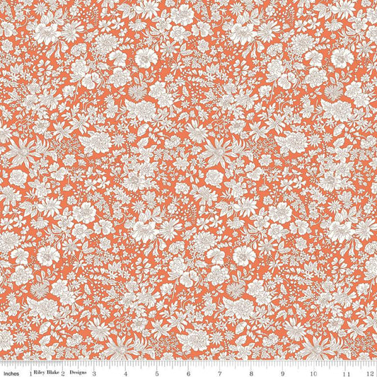 Yardage of Liberty Fabrics Emily Belle Tangerine, featuring a floral pattern with orange background.
Photo by RileyBlakeDesigns.com [image_link]