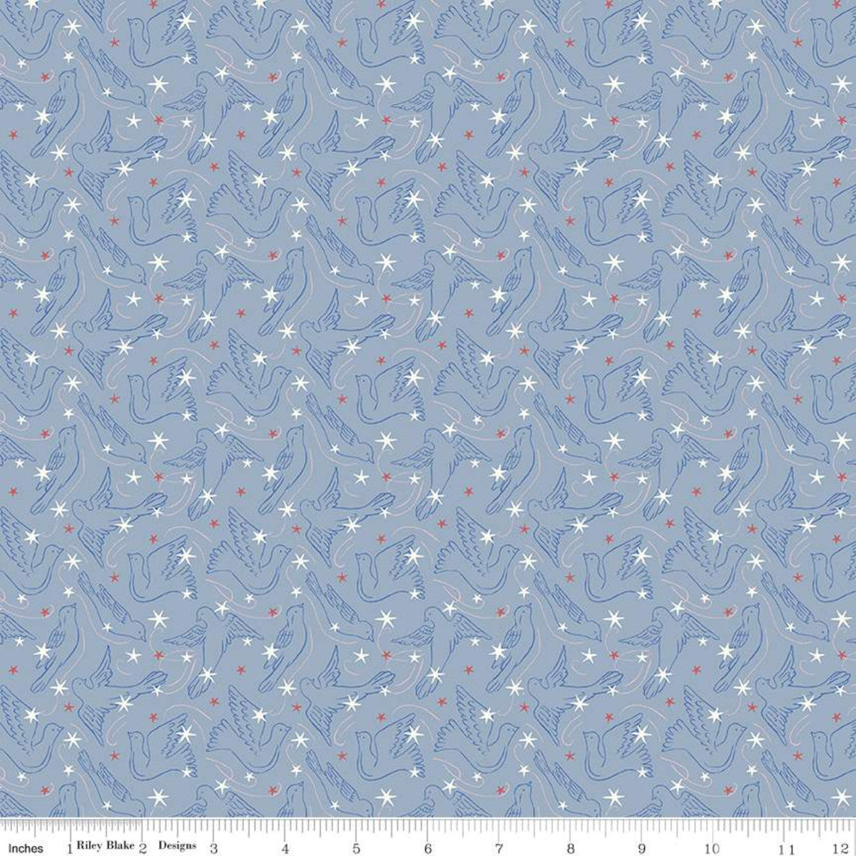 A fabric from the Merry and Bright Collection by Liberty Fabrics featuring a blue background with white and red dove star patterns.
Photo by RileyBlakeDesigns.com [image_link]