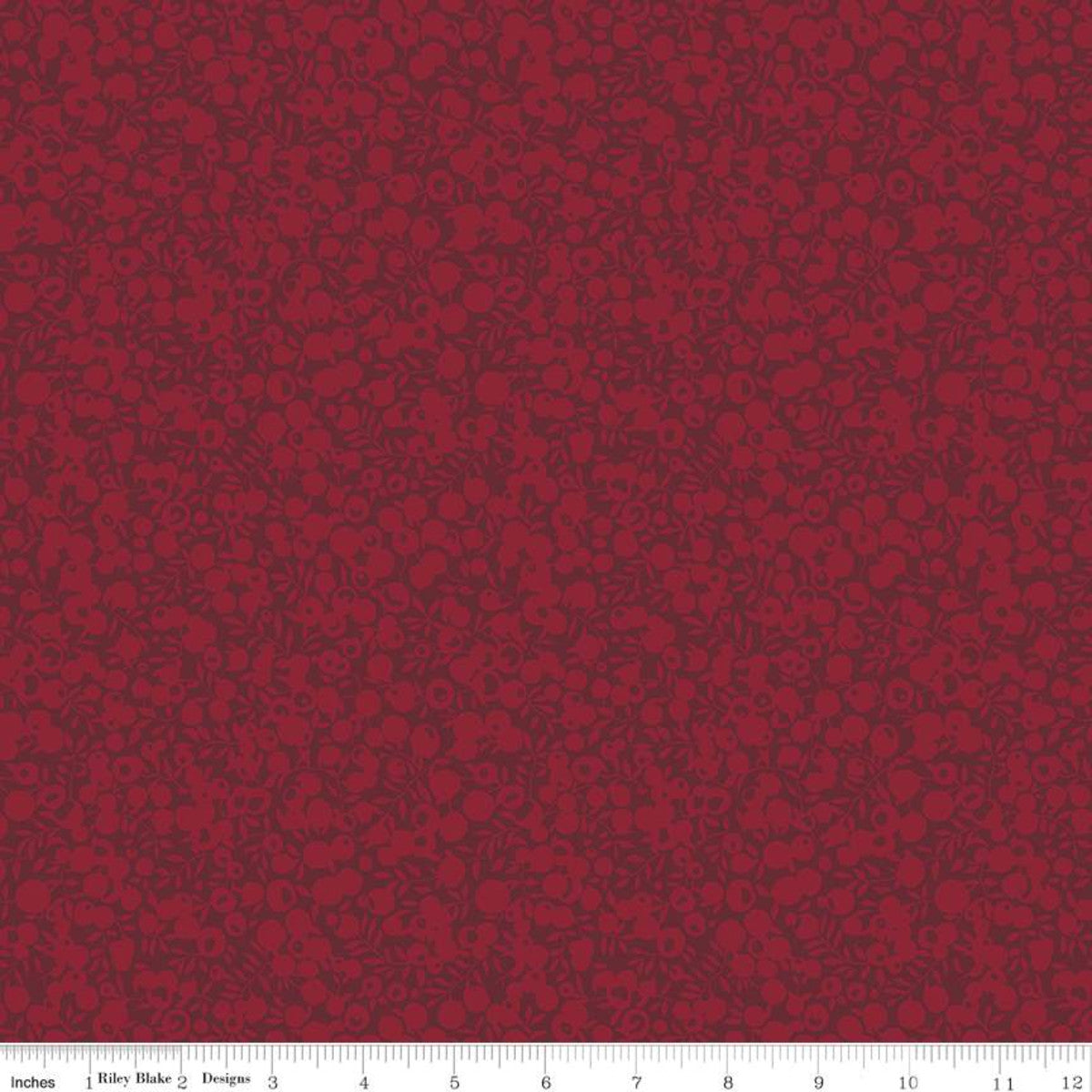 A red fabric with a tonal leaf and berry print design, branded by Liberty Fabrics.
Photo by RileyBlakeDesigns.com [image_link]