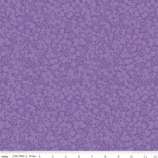 Purple fabric with a dense small floral and leaf pattern, shown flat with a ruler along the bottom edge for scale.
Photo by RileyBlakeDesigns.com [image_link]