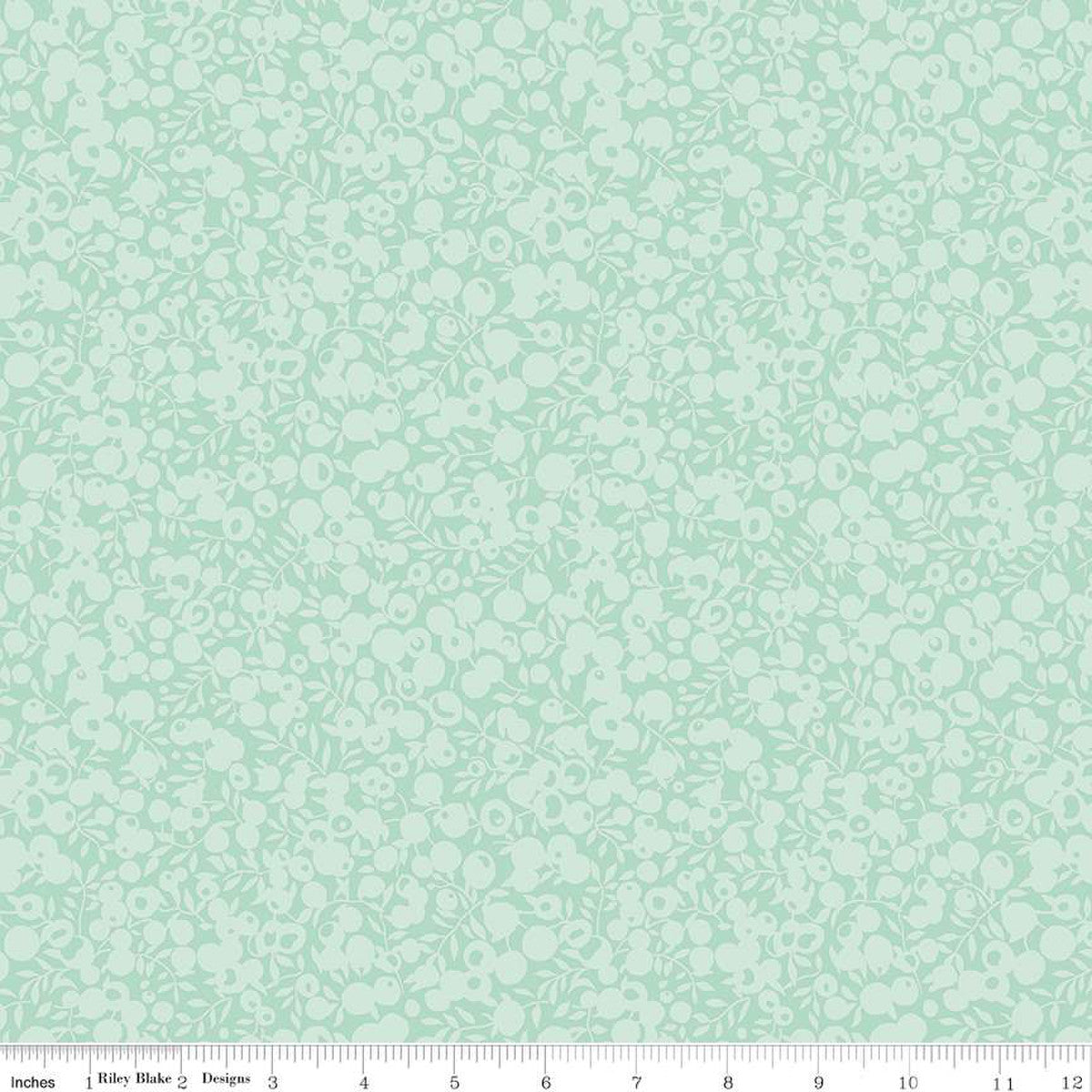 A yardage of Liberty Fabrics Wiltshire Shadow Mint Green fabric featuring a tonal leaf and berry print.
Photo by RileyBlakeDesigns.com [image_link]
