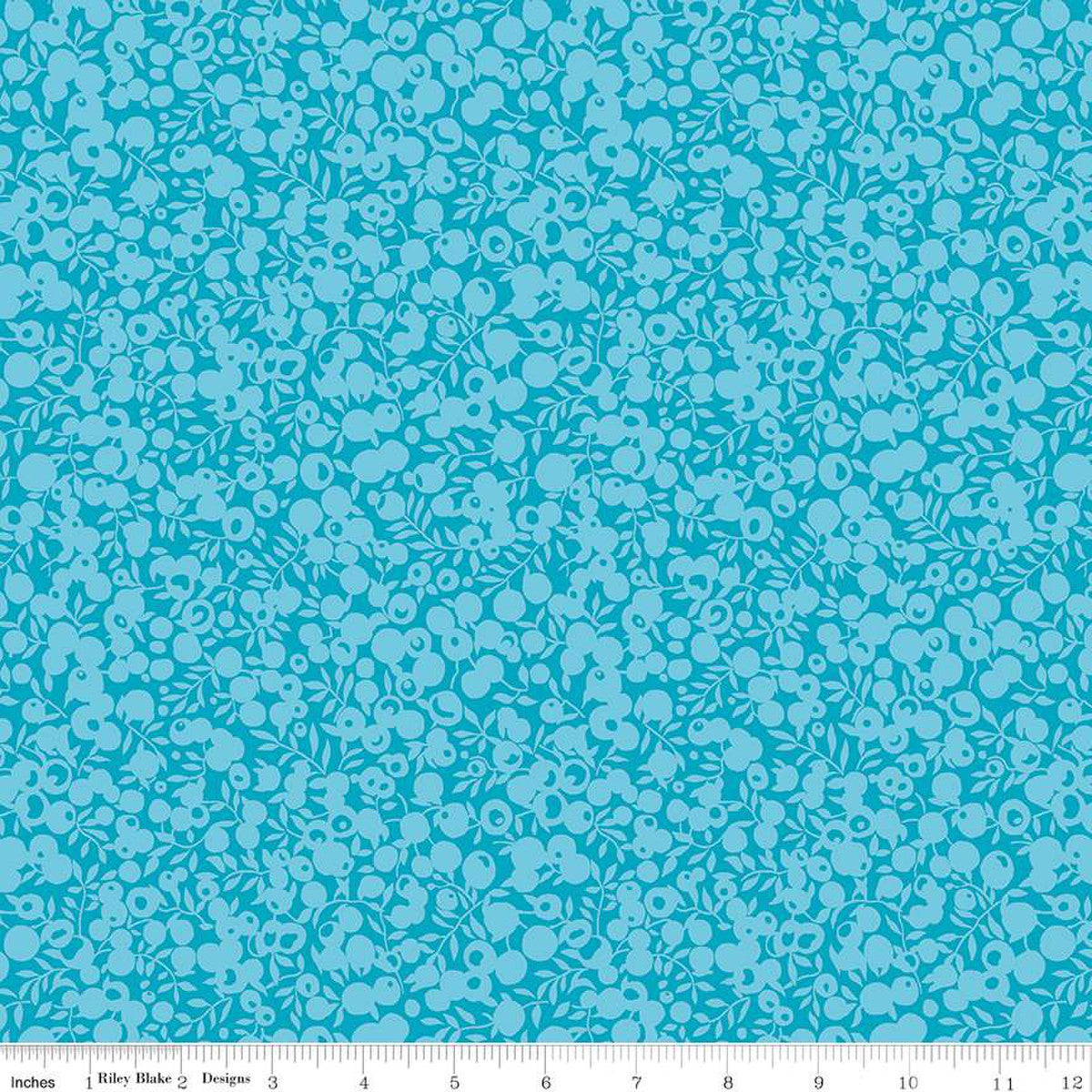 A pool of blue fabric with a shadow silhouette print, intended for quilting and crafting.
Photo by RileyBlakeDesigns.com [image_link]
