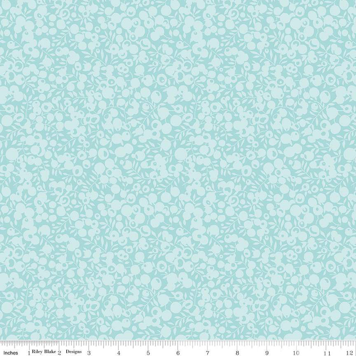 A close-up of a fabric from the Liberty Fabrics Wiltshire Shadow Sea Glass collection, showing a detailed view of the leaf and berry print in a sea foam green color.
Photo by RileyBlakeDesigns.com [image_link]
