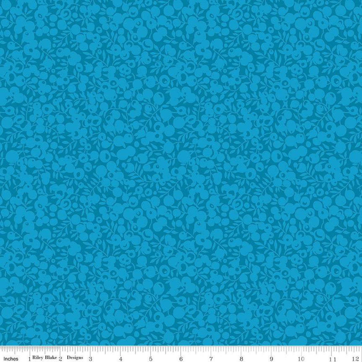 A close-up view of a turquoise fabric with a geometric pattern of shadows and highlights, indicating a two-tone design.
Photo by RileyBlakeDesigns.com [image_link]
