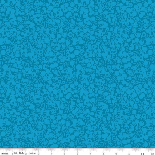A close-up view of a turquoise fabric with a geometric pattern of shadows and highlights, indicating a two-tone design.
Photo by RileyBlakeDesigns.com [image_link]