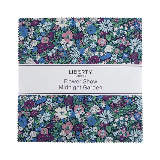 A folded fabric bundle from Liberty Fabrics with a floral print pattern labeled 'Flower Show Midnight Garden,' shown on a white background.
Photo by RileyBlakeDesigns.com [image_link]