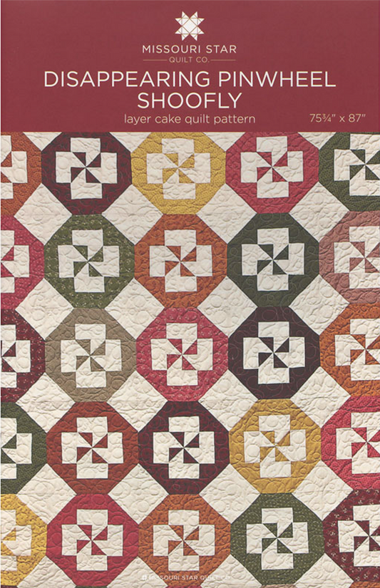 A paper quilting pattern for a Disappearing Pinwheel Shoofly, featuring a colorful geometric design, with text indicating the size of 74 3/4in x 86in and the pattern name.
Photo by MSQC [image_link]