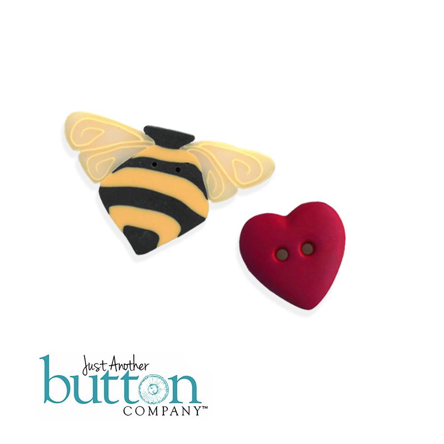 A craft button set from Just Another Button Company featuring a 3D bumblebee and a red heart-shaped button, displayed on a clean white background with the brand logo at the bottom.
Photo by Just Another Button Company [additional_image_link]