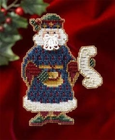 A cross stitch embroidery kit depicting a Santa Claus figure, with glass beads added for embellishment, set against a red background.
Photo by Mill Hill [image_link]