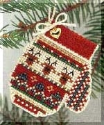 A completed cross stitch embroidery kit in the shape of a mitten, featuring a red, white, and green color scheme with glass beads.
Photo by Mill Hill [image_link]
