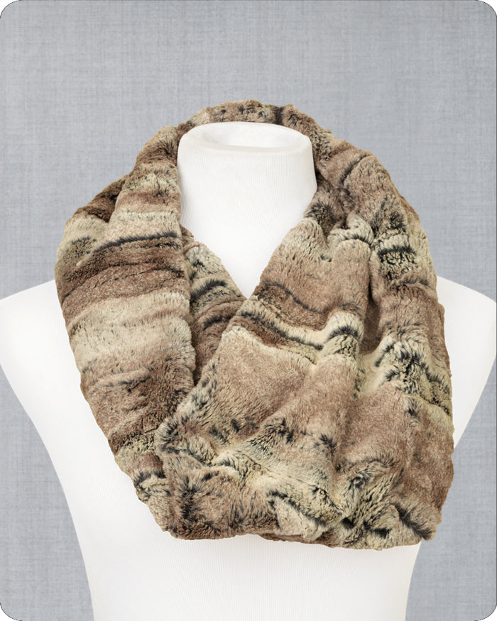 Brown and beige infinity scarf on a mannequin against a gray background.
Photo by Shannon Fabrics [image_link]