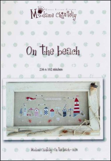 A cross stitch pattern depicting a beach scene with various elements like beach houses, lighthouse, starfish, and crabs on a white background.
Photo by madamechantilly.com [additional_image_link]
