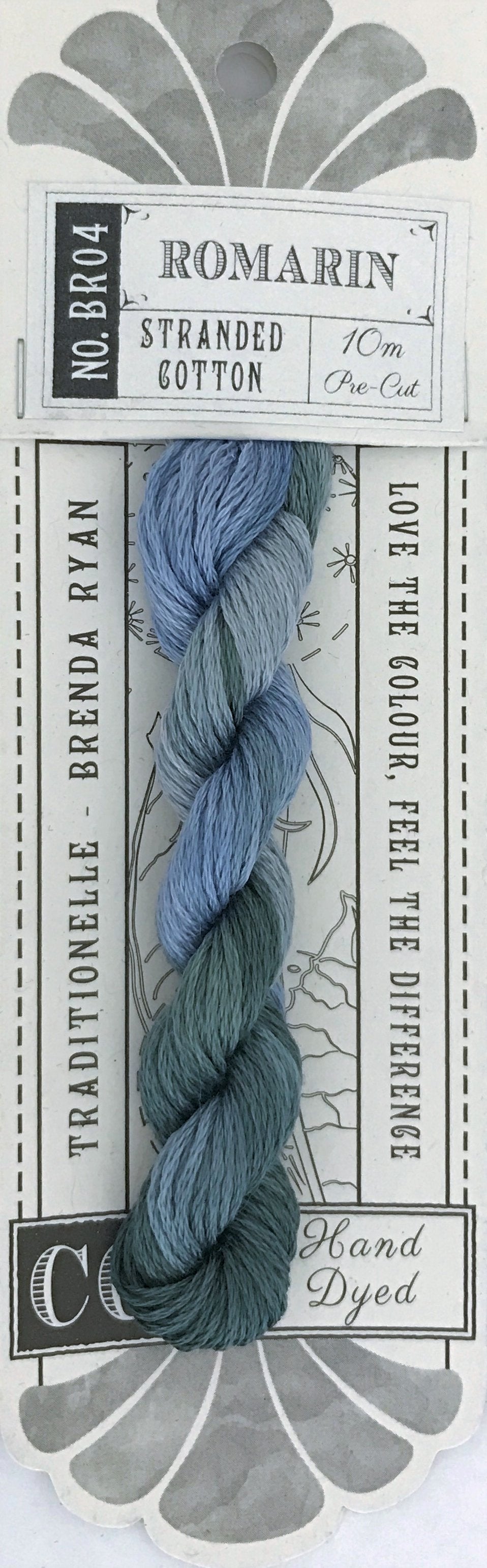 A packaged skein of embroidery floss labeled 'ROMARIN' with a gray floral card backing. The floss is braided in a blue-to-teal gradient, and text on the package includes 'Stranded Cotton', '10 mm Coiled', and 'Hand Dyed'.
Photo by cottagegardenthread.com [additional_image_link]