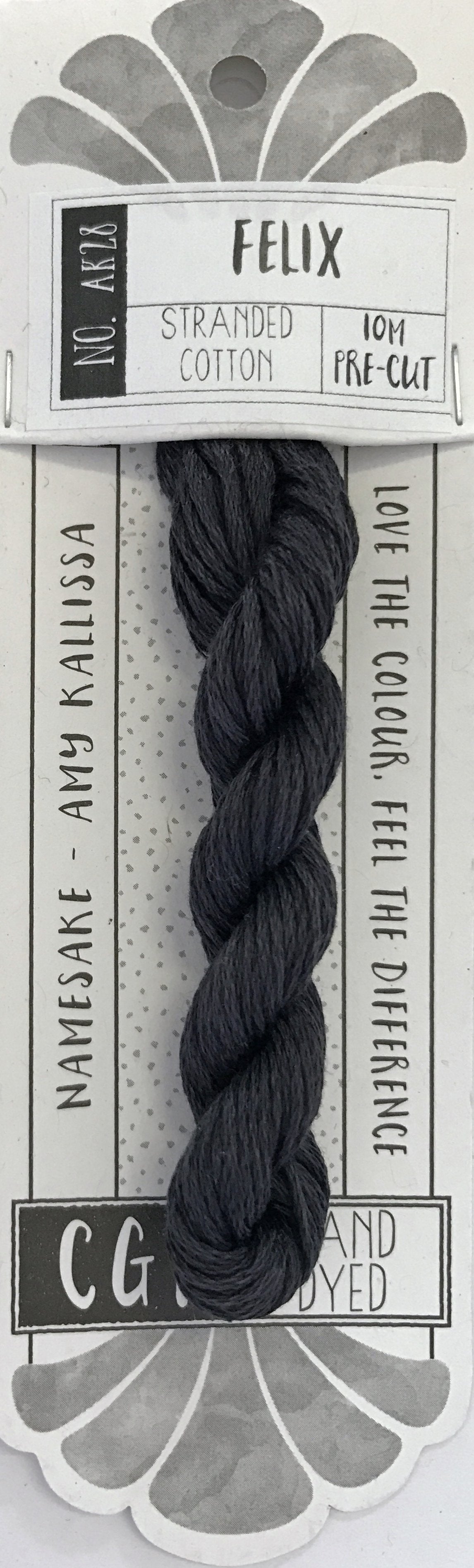 A packaged pre-cut embroidery thread bundle labeled 'FELIX' on a white and gray card. The thread is a very dark charcoal gray, almost black, and is shown twisted into a braided bundle.
Photo by cottagegardenthread.com [additional_image_link]