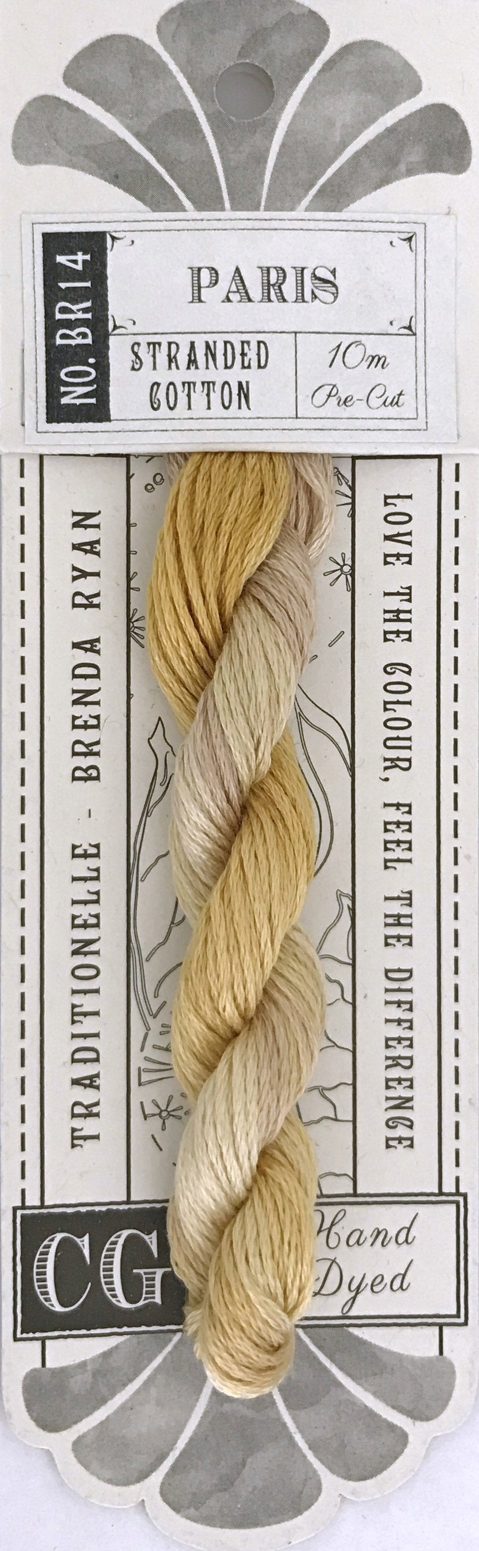 A packaged skein of light cream/beige embroidery floss on a white card with gray decorative graphics and text reading Paris, No. BR14, Stranded Cotton, 10m, The Cut, and CG.
Photo by cottagegardenthread.com [additional_image_link]