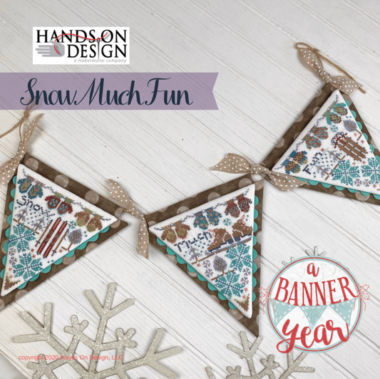 A festive triangular banner flag set with winter-themed printed panels and beige ribbon bows, displayed on a white wood background with decorative snowflake cutouts. Brand text 'HANDS ON DESIGN' appears at top left, with 'Snow Much Fun' in a purple banner and 'a BANNER Year'.
Photo by HandsOnDesign.biz [image_link]