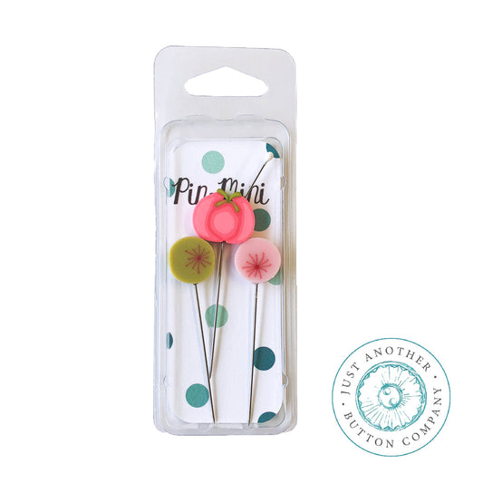 Packaging of 'Sew Sweet Pin Mini' from Just Another Button Company, displaying three decorative sewing pins with polymer clay tops in pink, green, and pink colors.
Photo by JustAnotherButtonCompany.com [image_link]