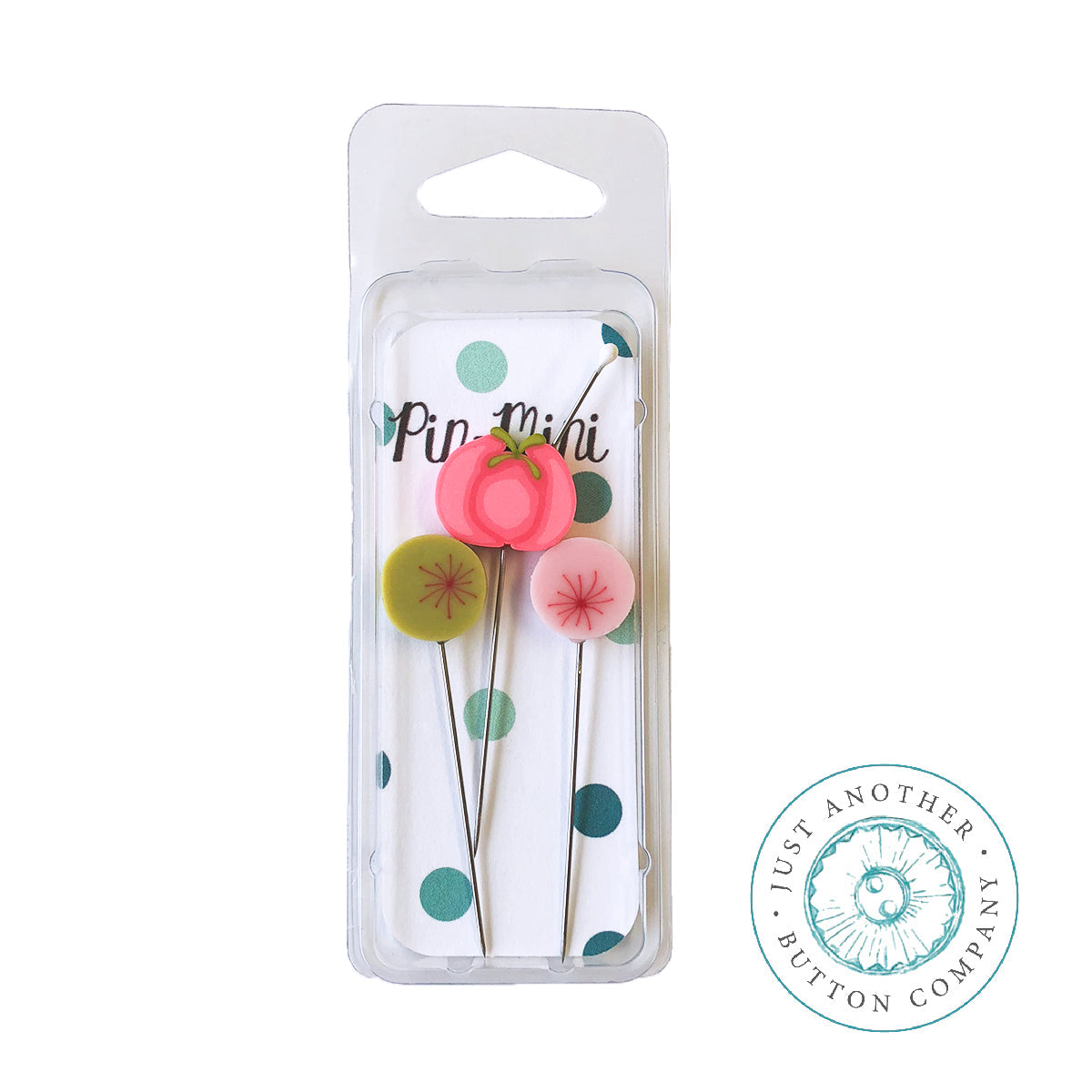 Packaging of 'Sew Sweet Pin Mini' from Just Another Button Company, displaying three decorative sewing pins with polymer clay tops in pink, green, and pink colors.
Photo by JustAnotherButtonCompany.com [image_link]