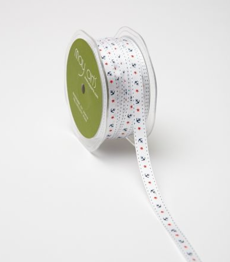 White ribbon with navy blue anchors and red stars.
Photo by MayArts.com [additional_image_link]