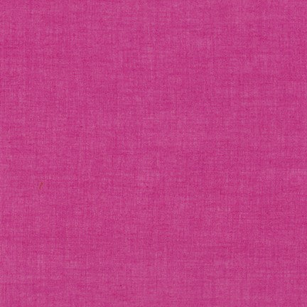 A close-up of a bright pink textured fabric with a woven linen-like pattern.
Photo by RobertKaufman.com [image_link]