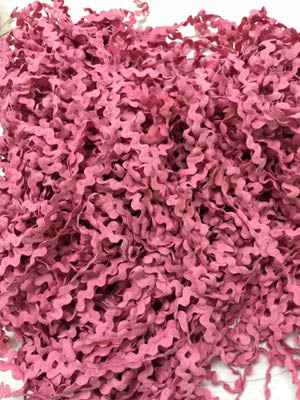 Close-up of pink ric rac.
Photo by Ladydotcreates.com [additional_image_link]