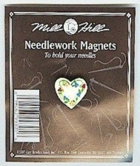 A package of Mill Hill Needlework Magnets, featuring a small heart-shaped magnet with a floral pattern on the front of the brown cardboard backing.
Photo by Wichelt.com [additional_image_link]